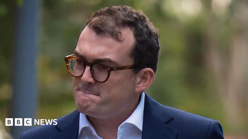 Suffolk MP Patrick Spencer arrives at court for sexual assault trial